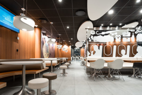 McDonald’s Arlanda Sky City

ROL Fredbergs would like to proudly present one of our latest projects that we have undertaken for McDonalds restaurants. McDonald's in Sky City within Arlanda airport, has opened a new system where the food is cooked to order and guests are then served at the tables. “With our new ordering and cooking system and table service, we offer our guests an even better restaurant experience”, says restaurant owner Roland Edin. The new system is expected to reduce food waste by 20 percent. “This concept looks very nice”, says ROL Fredbergs project manager Anders Gillström. We asked some of the customers their opinion on the restaurant and they agreed with Anders. “This is a calm place to sit down to rest and refill with new energy”, says Kim, one of the early morning customers.
ROL Fredbergs was given the go ahead to undertake the Project management services for a new construction of a McDonald's restaurant at Sky City. It is a very comprehensive project and its implementation took 9 weeks. Then followed 3 weeks of work on dismantling and restoring the room where McDonald's had the previous restaurant at the airport. The project included elements such as floating flooring, laying tiles, building walls, electrical work, painting, installing furnishings, installing alarms, coordinating kitchen construction and installing payment equipment and more.
“What was a bit special and challenging about this project was that there are two very sensitive tenants who are neighbours to the restaurant we built, a hotel and a bank. This meant that jobs that sound a lot like drilling or sawing could only be performed during specially agreed times of the day”, says Anders Gillström. We also had to make certain adjustments during the project because the conceptual drawing did not always match the fire protection equipment of the premises. But we made these adjustments in discussion with Per Widmark of McDonalds, during the project, says Anders. Thanks to a good dialogue, this did not create any problems.
We would like to take the opportunity to thank Per for good cooperation and positive dialogue during the project. The restaurant has become a very nice dining environment and the new layout for both the kitchen and the staff room is working well. “A tremendous improvement over the old restaurant”, says our Project Manager Anders. The new concept that has been built at Arlanda is called "Airport" to signify that it is used only at airports. https://rolfredbergs.com/